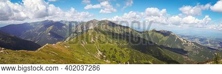 Summer Panoramic View Of Tatra Mountains, Kasprowy Wierch. Panorama Landscape. Hiking Concept Scener