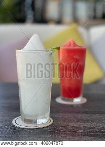 Lime Smoothie In Glass On Grey Table, Stock Photo