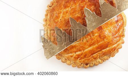 epiphany cake and crown on white background