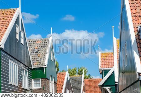Typical Dutch Family Houses, Traditional Village Historic Architecture Of Marken Island, Netherlands