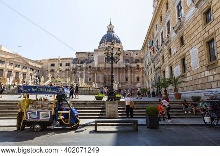 Tourists And Citizens Stroll In The Historic Center Of Palermo, In Via Maqueda