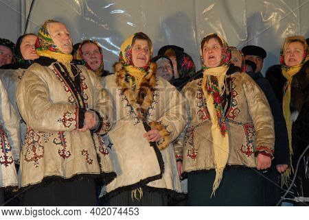 Goroshova, Ternopil Oblast, Ukraine - 14.01.2013: Young man is dressed up in Malanka costume. Malanka celebration in Goroshova village.