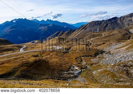 Scenic Mountain Road In The Alps In Autumn