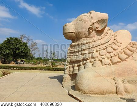 Closeup Of Beautiful Huge Or Big Lord Shiva Vehicle Nandi, Basava In A Blue Sky Background