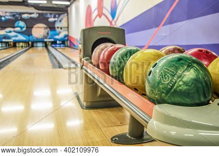Bowling Balls Against Background Of Empty Lanes In Bowling Alley. Active Leisure. Sports Activities 
