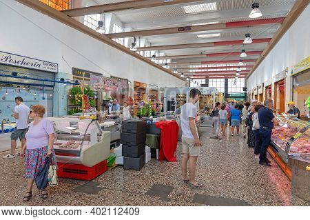 Como, Italy - June 15, 2019: People Shopping At Indoor Farmers Market In Como, Italy.