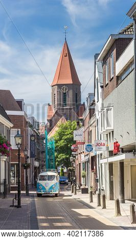 Montfoort, Netherlands - May 21, 2020: Volkswagen Van Going Thtough A Shopping Street In Montfoort, 