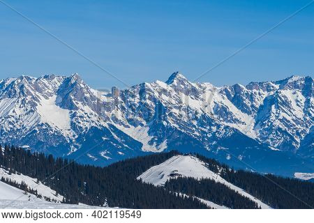 View Of The Snow-capped Mountains In The Schmitten Ski Area In Zell Am See. In The Background Is A B