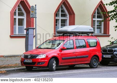 Berlin, Germany - September 12, 2013: Red Estate Car Dacia Logan Mcv In The City Street.