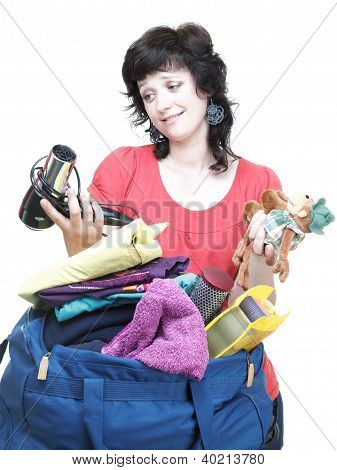 Woman And Daughter Hand Crammed Full Of Clothes And Shoulder Bag Isolated
