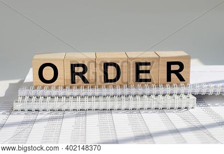 Order Word Inscription On Wooden Cubes. Business And Law Concept