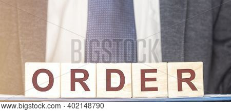 Order Word Inscription On Wooden Cubes. Business And Law Concept