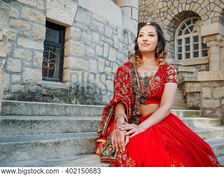 Beautiful Ethnic Indian Saree. Young Woman In Red, Colorful, Sensual, Wedding And Very Feminine Outf