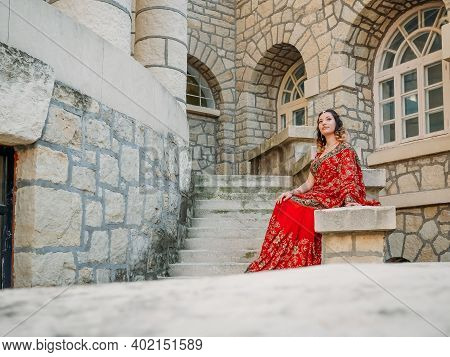 Beautiful Ethnic Indian Saree. Young Woman In Red, Colorful, Sensual, Wedding And Very Feminine Outf