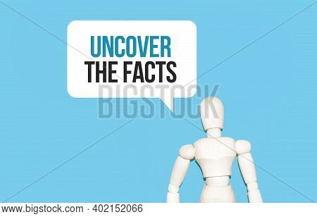 The Wooden Man And White Cloud With Text Uncover The Facts. The Content Of The Lettering Has Implica