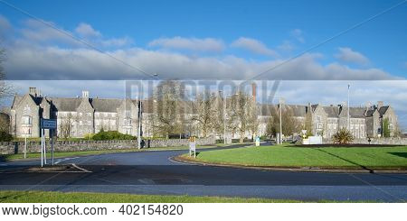 Old Stone Building . St. Lomans Hospital In Mullingar Town On Sunny Wintery Day.
