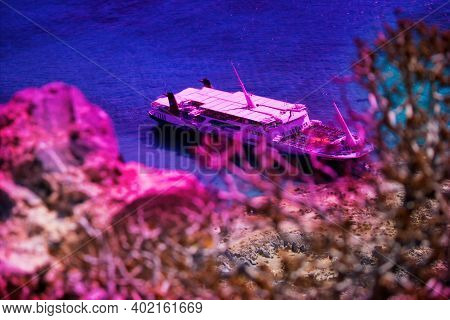Crete, Greece: Aerial Drone Selective Focus Shot Of Cruise Ship Docked In Imeri Gramvousa In The Sma