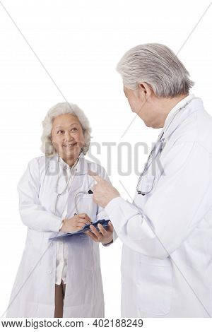 Standing Portraits Of Two Elderly Senior Doctors High Quality Photo