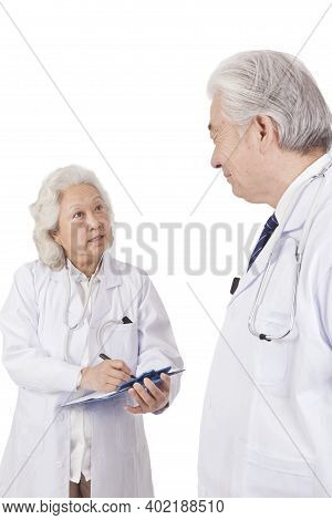 Standing Portraits Of Two Elderly Senior Doctors High Quality Photo