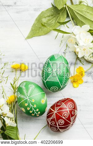 Three Pysanky Handmade Easter Eggs. Ukrainian Pysanky Decorated With Wax-resist Dyeing Technique. Ho