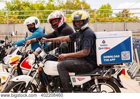 Express Service Home Delivery Bikes With African Riders Outside Local Pick N Pay Grocery Store