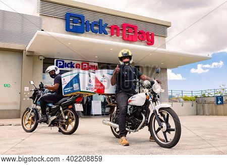 Express Service Home Delivery Bikes With African Riders Outside Local Pick N Pay Grocery Store