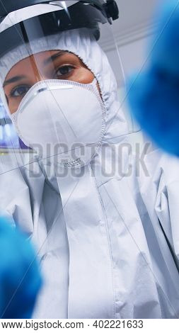 Pov Of Dentist In Ppe Suit Against Covid Working On Patient Mouth Hygine In Dental Office With New N