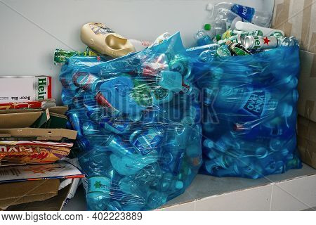Separately Sorted Waste. Used Plastic Bottles, Metal Cans And Cardboard Packaging Are Collected In W