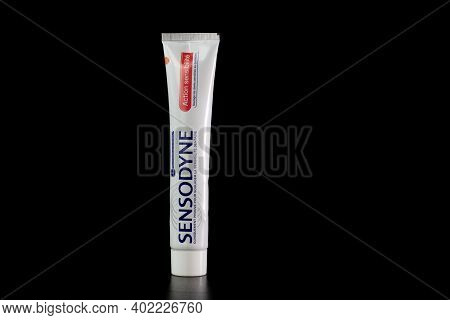 Sensodyne Toothpaste Tube On Black Background. Bucharest, Romania, 2021