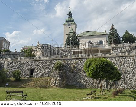 Ruzomberok, Slovakia, August 30, 2020: View Of Park In Ruzomberok Old Town City Center With Baroque 