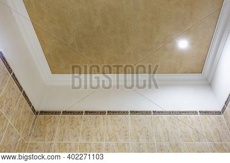 Detail Of Corner Ceiling With Intricate Crown Molding. Suspended Ceiling And Drywall Construction In