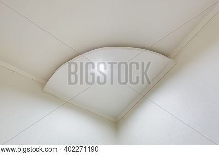 Detail Of Corner Ceiling With Intricate Crown Molding. Suspended Ceiling And Drywall Construction In