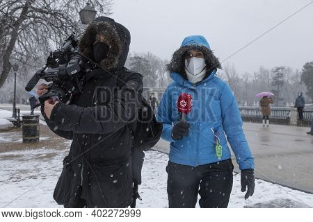 Madrid, Spain - January 07, 2021: A Journalist And A Telemadrid Camera Operator, Working In The Buen
