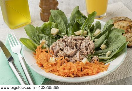 Rucula, Tuna, Parmesan And Carrot Salad With Olive Oil And Orange Juice.