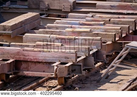 Shipyard For Small Boats That Need Repair. Slope Of Wood And Metal On The Water