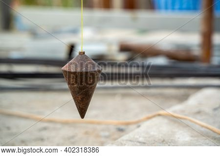 Plumb For Level Measurement At Construction Site.