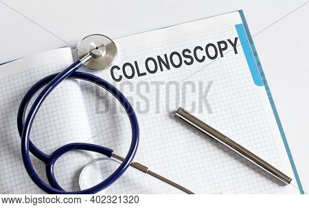 Paper With Text Colonoscopy On Table With Stethoscope