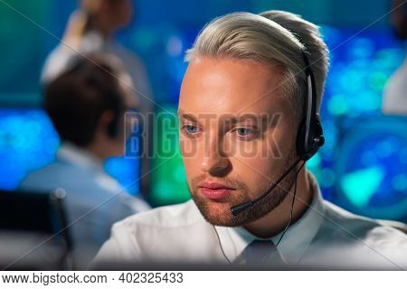 Workplace Of The Air Traffic Controllers In The Control Tower. Diverse Team Of Aircraft Control Offi