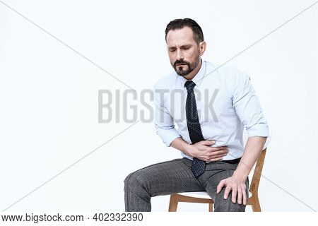 A Young Man Has A Stomach Ache.