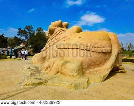 Closeup Of Beautiful Huge Or Big Lord Shiva Vehicle Nandi, Basava In A Blue Sky Background