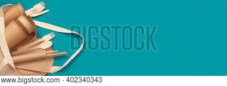 Banner With Set Of Eco-friendly Tableware - Paper Cups And Containers In Cotton Bag On Green Backgro
