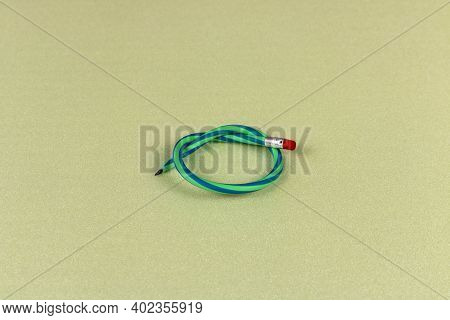 Flexible Pencil On A Light Background. Selective Focus