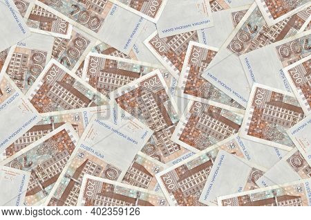 200 Croatian Kuna Bills Lies In Big Pile. Rich Life Conceptual Background. Big Amount Of Money