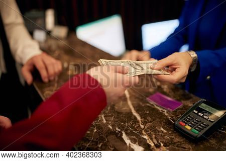 Close up of a cash excange between two people