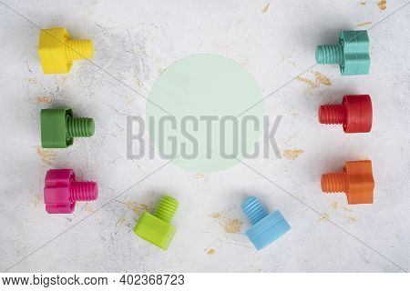 Mock Up Background Educational Constructor For Children, Nuts And Bolts In The Form Of Geometric Sha