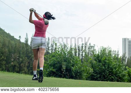 Golfer Women Sport Course Golf Ball Fairway. People Lifestyle Woman Playing Game Golf Tee Of On The 
