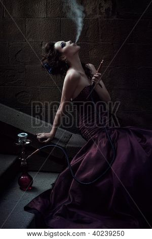 Beautiful woman in violet dress