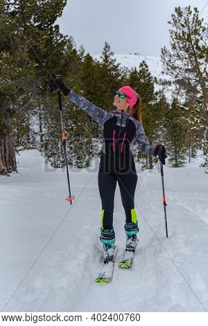 Woman Doing Ski Mountaineering In The Mountains In The Pyrenees In Europe In Winter 2020.