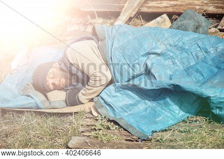 Sad And Upset Homeless And Unemployed Person In Ruins, Economic Collapse And Poverty, Job Loss, Unem