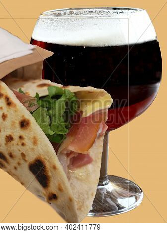 Piadina With Salad And Ham And Dark Beer